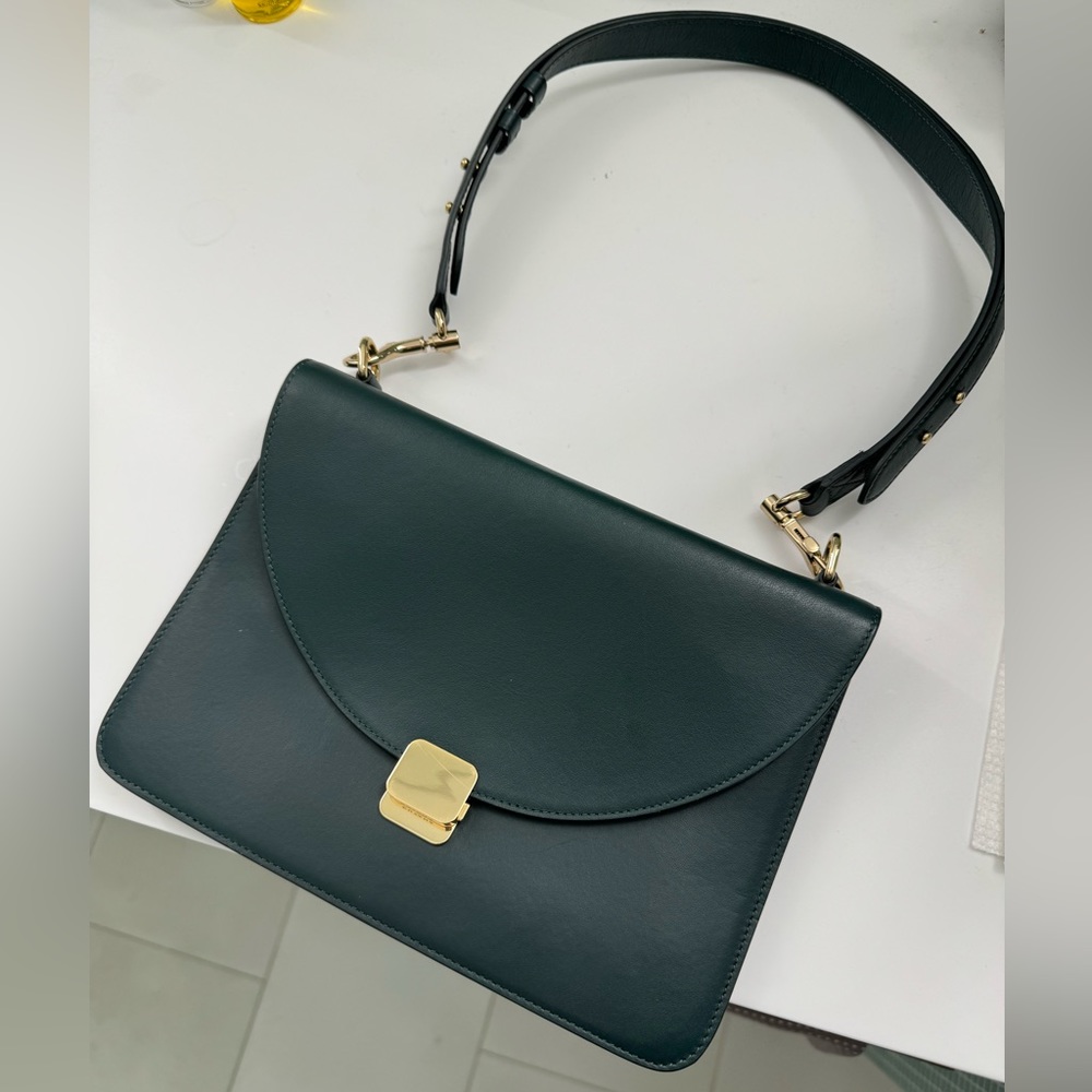 Cuyana deep emerald green leather shoulder bag with trifold